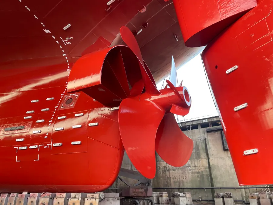 Red-painted stern with a pre-shrouded vane duct ahead of the propeller