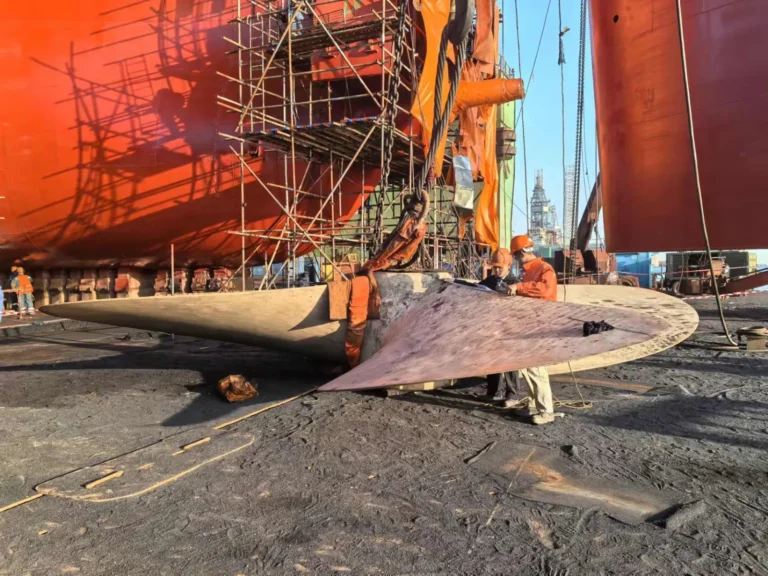 Large propeller blade being worked on at the shipyard
