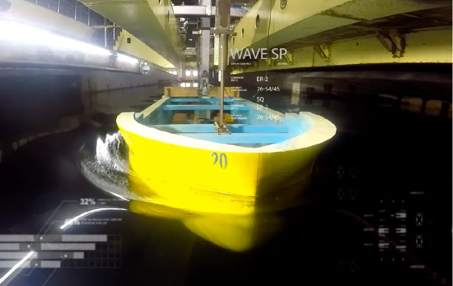Scale hull model running in a towing tank
