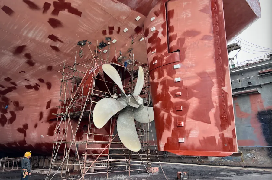 Propeller and energy saving device being fitted on scaffolding in drydock